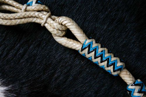 19404: Showman ® Braided Natural Rawhide Romal Reins with Leather Popper and Blue Rawhide Beads Reins Showman