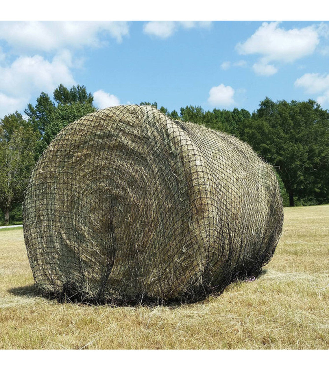 Large Round Black Bale Net For Horses In Empty Field