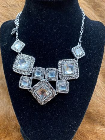 NC4254: This Attitude BY Montana Silversmiths features large square chunky rope wrapped charms for Primary Showman Saddles and Tack