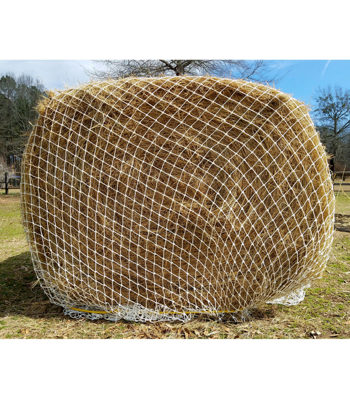 Texas Haynet Heavy Gauge Round Bale Hay Net In Empty Field