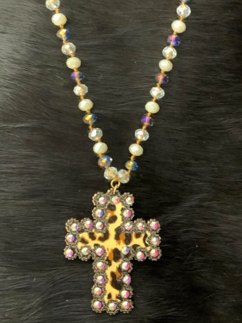 WN0561WGWHT: 30" iridescent beaded necklace with 2-1/2" cheetah cross, Lobster claw clasp with ad Primary Showman Saddles and Tack