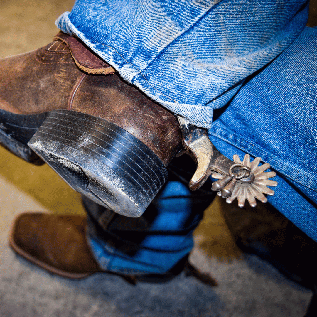 Western Boot Spurs On Mens Boots With Blue Jeans