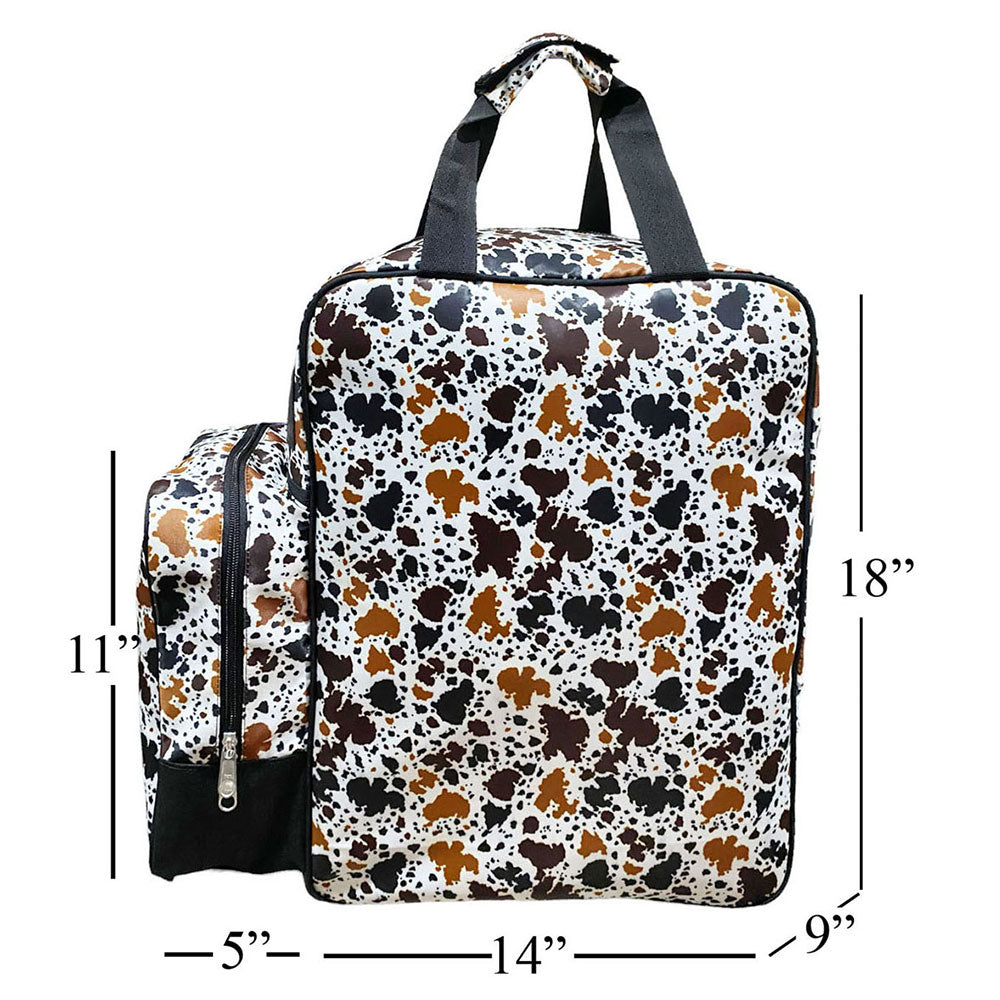 Textured and Fashion Print collection image featuring Showman Cow Print Equestrian Bag