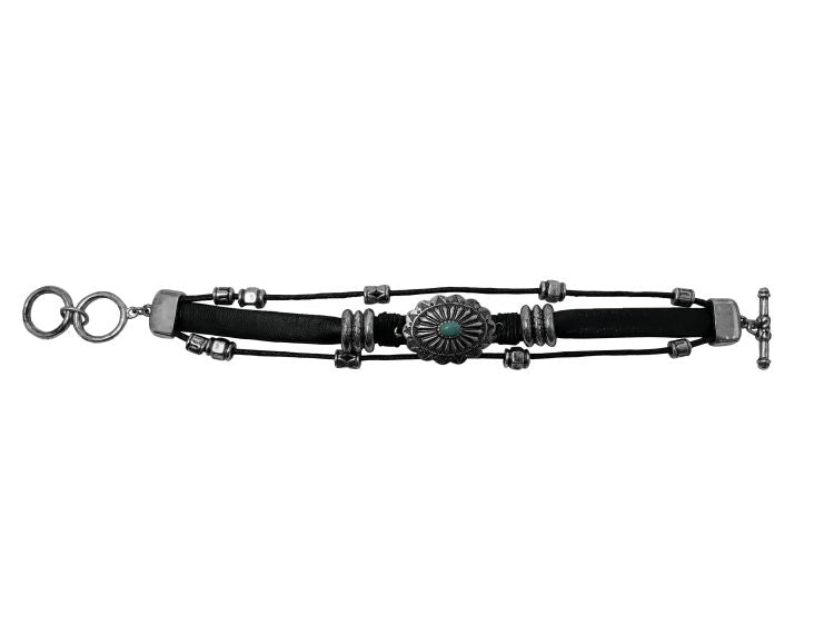 Faux Leather bracelet featuring Concho charm and toggle clasp