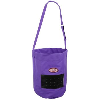 Hay bag in use at a stable, emphasizing practicality for horse owners.